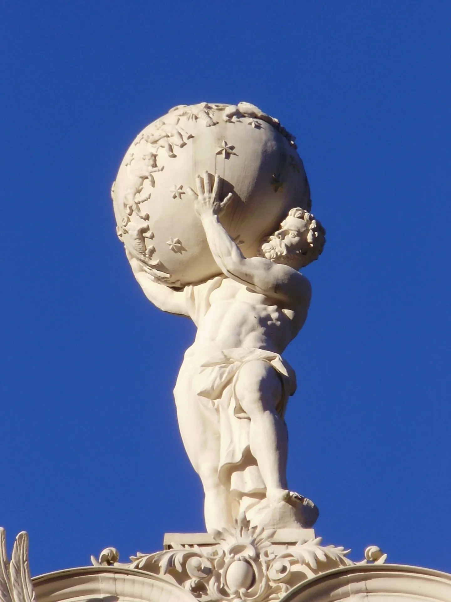Classical globe-bearer holding a celestial sphere