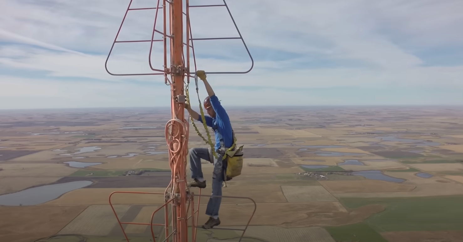 Climber scaling a radio tower